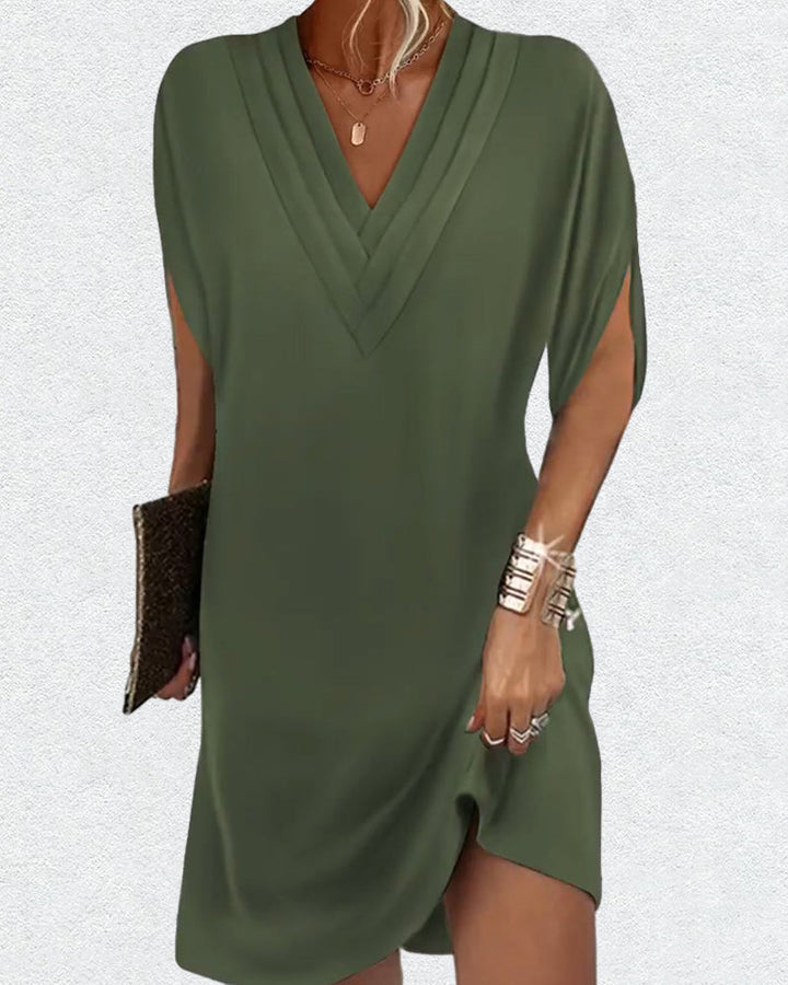 Robe élégante à manches fendues de couleur unie